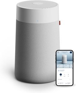 Blueair Blue Pure 311, voted the best air purifier for bedrooms, in a sleek white cylinder.